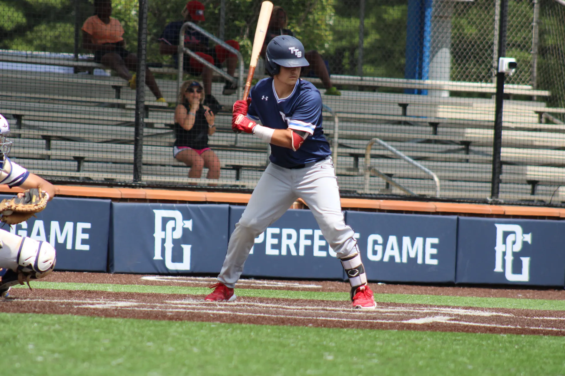 Time to Sign hitter in front of the Perfect Game banner at WWBA
